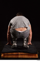  Larry Steel  1 boots dressed grey camo trousers grey t shirt kneeling shoes whole body 0005.jpg